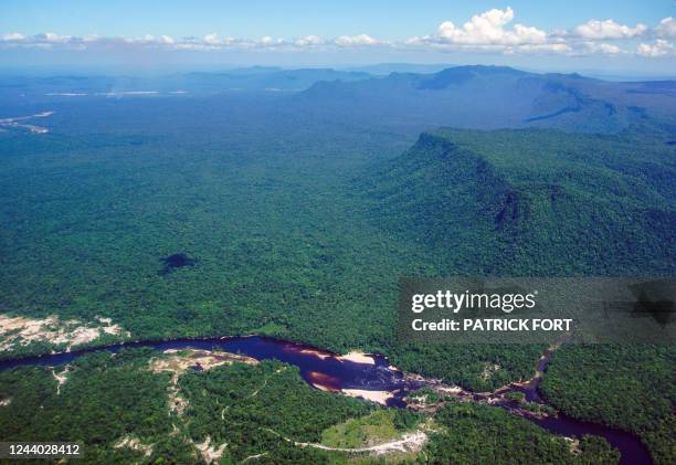 Aerial view of the Potaro River running across the Kaieteur National Park which sits in a section of the Amazon rainforest in the Potaro-Siparuni...