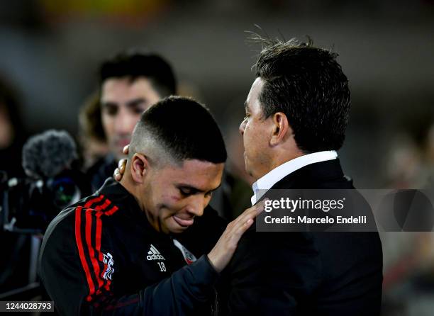 Juan Fernando Quintero greets Marcelo Gallardo coach of River Plate after a match between River Plate and Rosario Central as part of Liga Profesional...