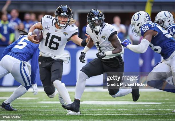 Trevor Lawrence of the Jacksonville Jaguars runs the ball during the game against the Indianapolis Colts at Lucas Oil Stadium on October 16, 2022 in...