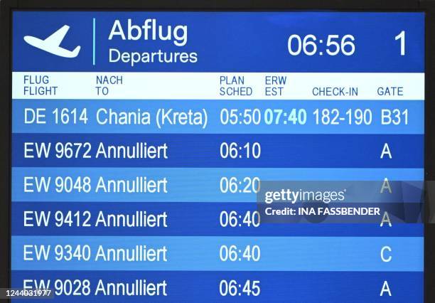 Display board shows the cancelled flights during a three-day strike of the Eurowings airline at the Duesseldorf airport, western Germany on October...