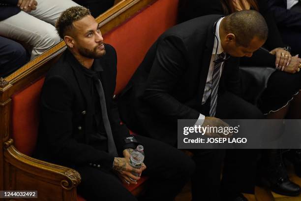 Paris Saint-Germain's Brazilian forward Neymar attends the opening audience with his father Brazilian former footballer Neymar Senior at the...