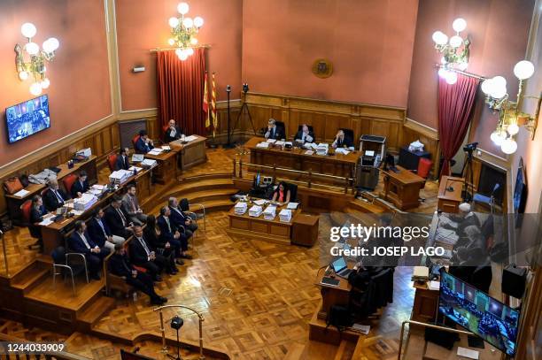 This photograph shows a general view of the courtroom as Paris Saint-Germain's Brazilian forward Neymar attends the opening audience with his father...