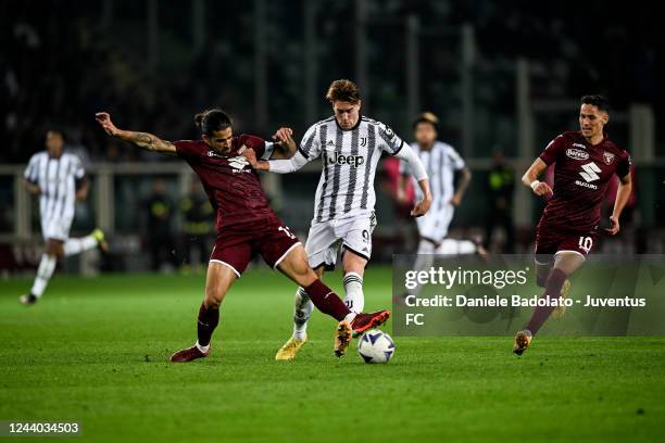 Dusan Vlahovic of Juventus and Ricardo Rodriguez of Torino during the Serie A match between Torino FC and Juventus at Stadio Olimpico di Torino on...