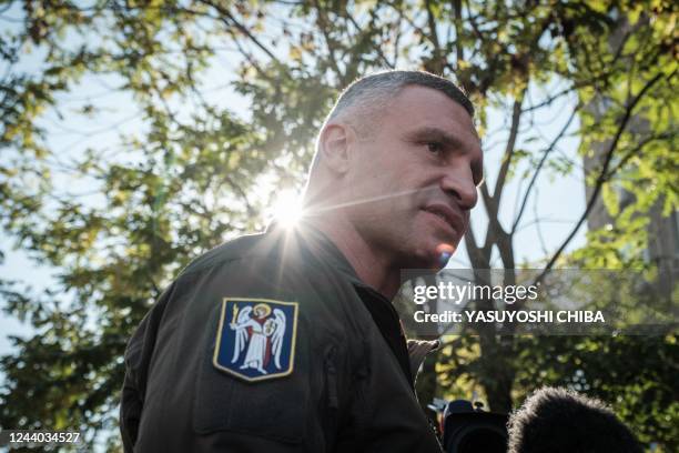 Kyiv mayor Vitali Klitschko speaks to press after a drone attack in Kyiv on October 17 amid the Russian invasion of Ukraine. - Ukraine officials said...