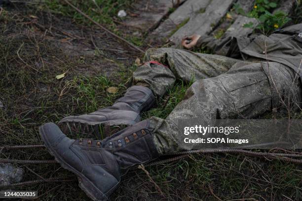 Russian soldier's body is on the ground in Lyman. Although more settlements in eastern Ukraine have been liberated, many major infrastructures are...