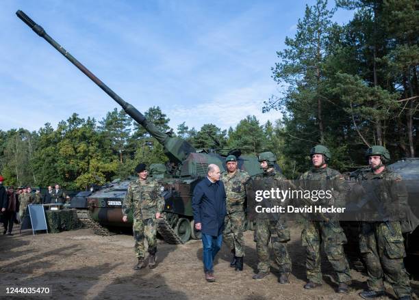 Chancellor Olaf Scholz during a visit at the Bundeswehr army training center in Ostenholz on October 17, 2022 near Hodenhagen, Germany. Scholz has...