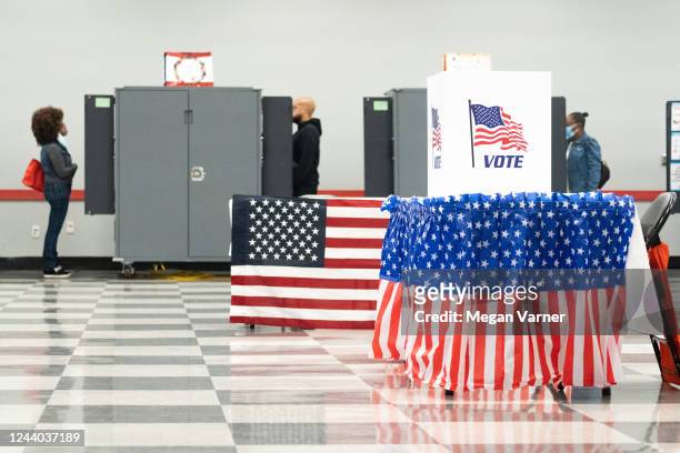 Voters turn out to cast their ballots as early voting begins on October 17, 2022 in Atlanta, Georgia. Early voting in Georgia starts October 17th to...