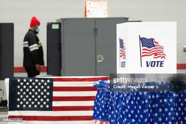 Voters turn out to cast their ballots as early voting begins on October 17, 2022 in Atlanta, Georgia. Early voting in Georgia starts October 17th to...