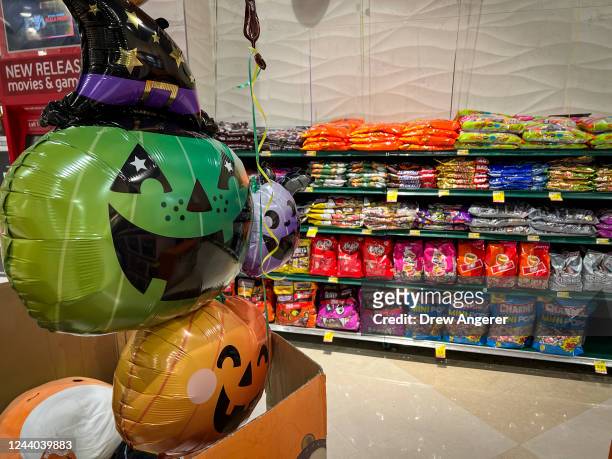 Halloween candy is for sale at a Harris Teeter grocery store on October 17, 2022 in Washington, DC. According to the most recent inflation report...