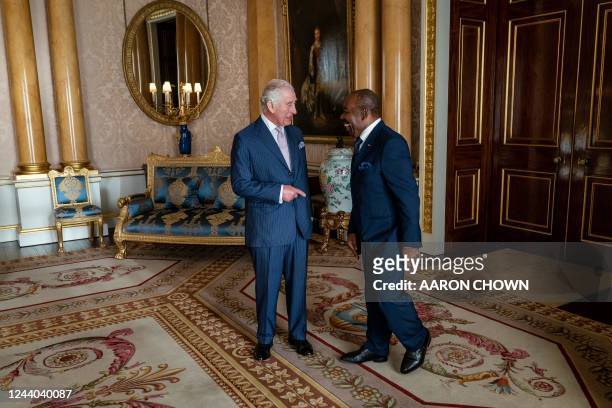 Britain's King Charles III welcomes Gabon's president Ali Bongo Ondimba at Buckingham Palace, in London, on October 17, 2022 for an audience...