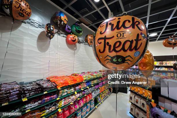 Halloween candy is for sale at a Harris Teeter grocery store on October 17, 2022 in Washington, DC. According to the most recent inflation report...