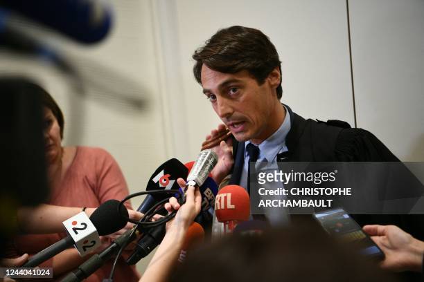 French lawyer Alexandre Silva addresses the press on October 17, 2022 at the Paris courthouse, as he leaves a hearing with a judge after his client...