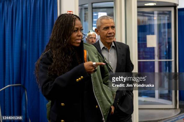 Former first lady Michelle Obama and former U.S. President Barack Obama arrive to cast their vote at an early voting venue on October 17, 2022 in...