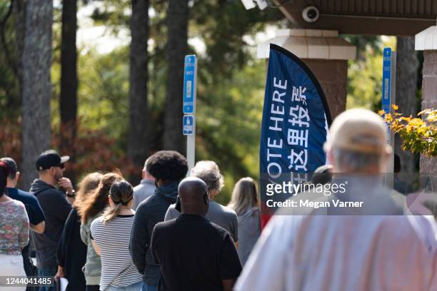 Voters turn out to cast their ballots as early voting begins on October 17, 2022 in Atlanta, Georgia. Early voting in Georgia runs from October 17th...
