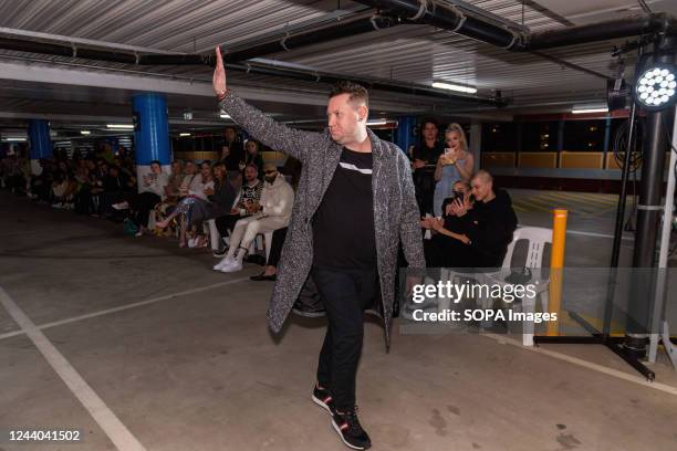 Designer Justin Cassin walks the runway at his Melbourne Fashion Week Runway Docklands, Melbourne. Justin Cassin men's wear designer staged his...