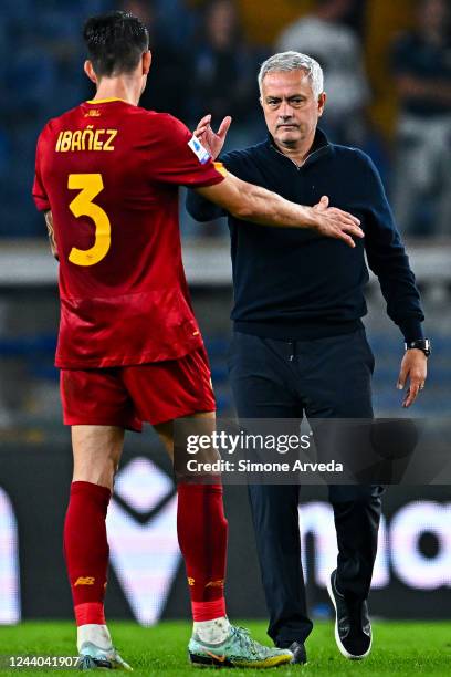 José Mourinho head coach of Roma celebrates with Roger Ibanez of Roma after the Serie A match between UC Sampdoria and AS Roma at Stadio Luigi...