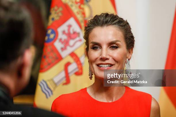 Queen Letizia of Spain greets guests during a defilee at Bellevue Palace on October 17, 2022 in Berlin, Germany. Spain's king and queen are making a...