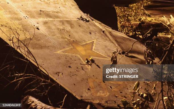 The wreckage of a Sukhoi Su-34 military jet lie at the crash site in the courtyard of a residential area in the town of Yeysk in southwestern Russia...