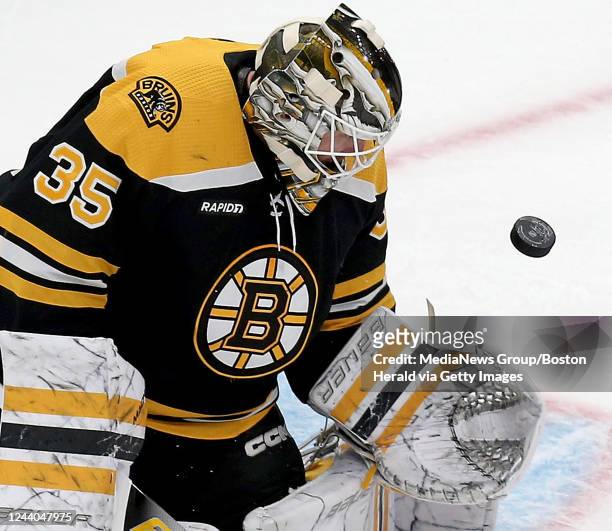 October 17: Linus Ullmark of the Boston Bruins keeps his eye on the loose puck during the third period of the NHL game against the Florida Panthers...