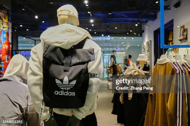 Models and clothes in an Adidas store in a shopping mall. In the second quarter of this year, Adidas' sales in China fell sharply by 35%. The world's...