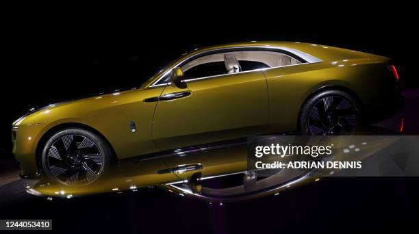 Rolls-Royce Spectre, their first fully electric car, is displayed during an unveiling at the company's Goodwood headquarters near Chichester,...