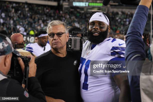 Philadelphia Eagles coach Jeff Stoutland poses with Dallas Cowboys offensive tackle Jason Peters during the game between the Dallas Cowboys and the...