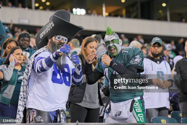 Dallas Cowboys and Philadelphia Eagles super fans compete during the game between the Dallas Cowboys and the Philadelphia Eagles on October 16, 2022...