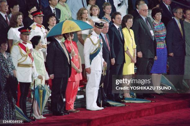 Britain's Prince Charles along with Foreign Secretary Robin Cook, Britain's First Lady Cherie Blair, outgoing governor Chris Patten, Britain's Prime...