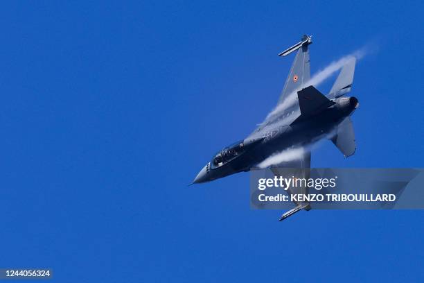 Belgian F-16 jet fighter takes part in the NATO Air Nuclear drill "Steadfast Noon" at the Kleine-Brogel air base in Belgium on October 18, 2022. -...