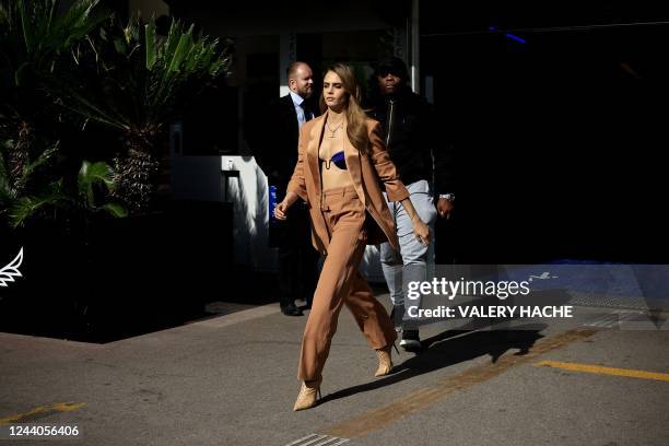 British model and actress Cara Delevingne leaves the Palais des Festivals after the presentation of her documentary series "Planet Sex" at the...