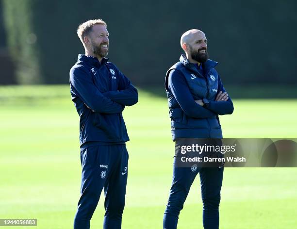 Head Coach Graham Potter and 1st Team Coach Bruno Saltor of Chelsea during a training session at Chelsea Training Ground on October 18, 2022 in...