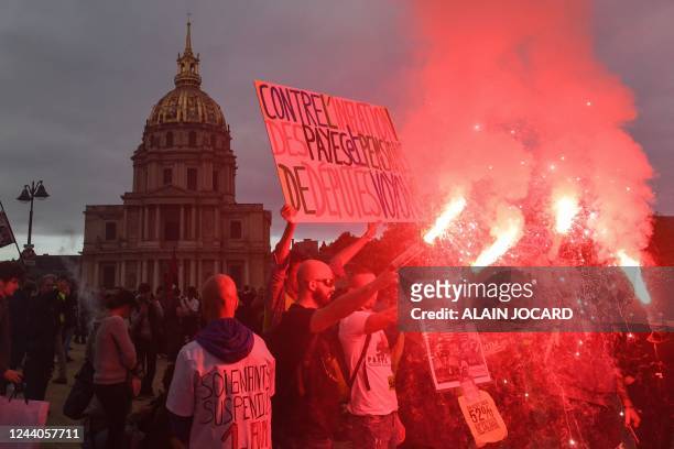 Protesters march during a demonstration in Paris, on October 18, 2022 after the CGT and FO trade unions called for a nationwide strike for higher...
