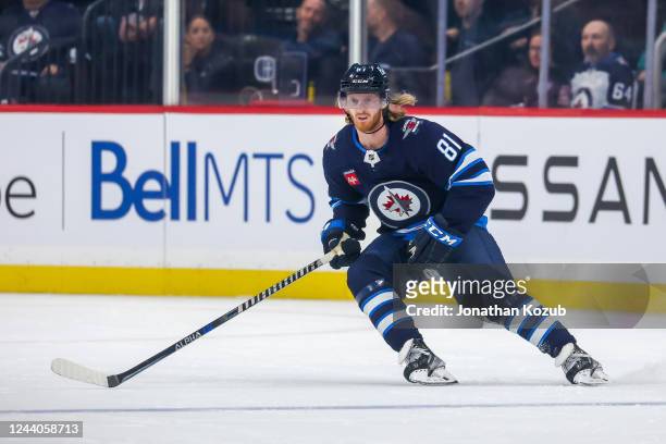 Kyle Connor of the Winnipeg Jets skates during second period action against the New York Rangers at Canada Life Centre on October 14, 2022 in...