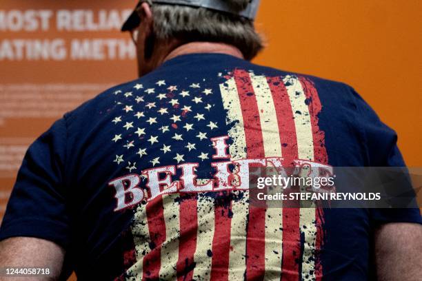 Visitor wears a shirt reading I believe at the Creation Museum in Petersburg, Kentucky, on September 30, 2022. - A leading figure in creationism in...