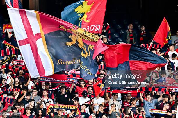 Fans of Genoa wave their flags and scarves prior to kick-off in the Coppa Italia match between Genoa CFC and Spal at Stadio Luigi Ferraris on October...