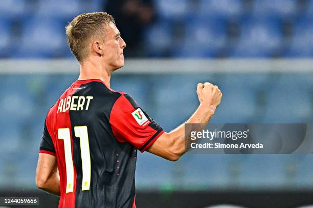 Albert Gudmundsson of Genoa celebrates after scoring a goal on a penalty kick during the Coppa Italia match between Genoa CFC and Spal at Stadio...