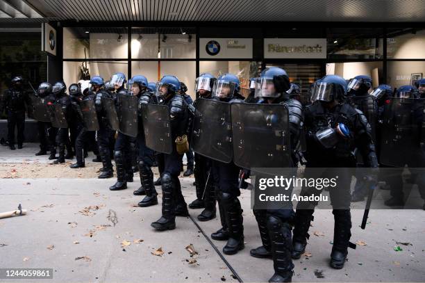 Anti-riot police take security measures during the demonstration held within the nationwide strike for higher salaries in Paris, France on October...