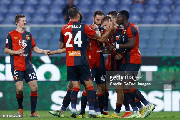 Albert Gudmundsson of Genoa CFC celebrates after scoring his team's first goal with team mates during the Coppa Italia match between Genoa CFC and...