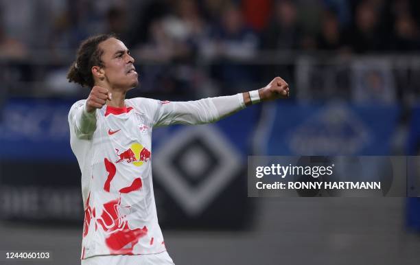 Leipzig's Danish forward Yussuf Poulsen celebrates scoring the 2-0 goal during the German Cup 2nd round football match RB Leipzig v Hambusg SV in...