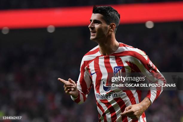 Atletico Madrid's Spanish forward Alvaro Morata celebrates after scoring his team's first goal during the Spanish league football match between Club...