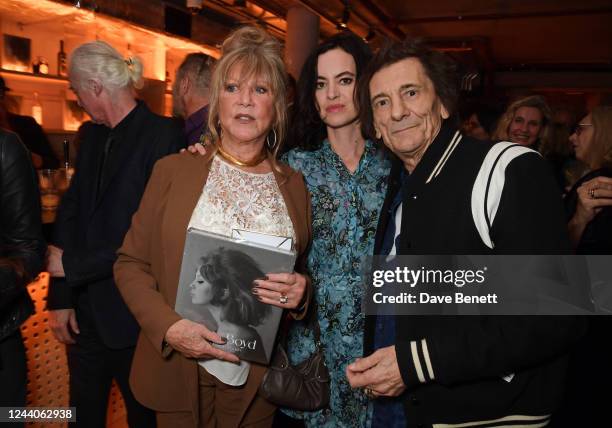 Pattie Boyd, Sally Wood and Ronnie Wood attend the launch of new book "Pattie Boyd: My Life In Pictures" by Pattie Boyd at The Lower Third on October...