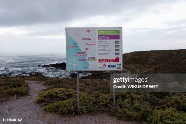 General view of a sign with hiking trail routes in Doringbaai on September 23, 2022. - With pink flamingos, white beaches and blue ocean waters, a...