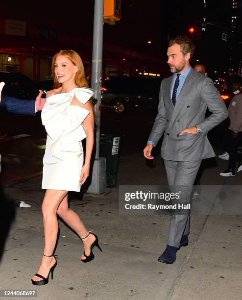 Jessica Chastain and Gian Luca Passi de Preposulo are seen walking in midtown on October 18, 2022 in New York City.