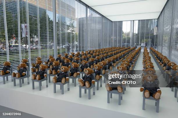 Little bears" dressed in suits sit neatly in a hut outside a Rui Ou department store in Shanghai, China, on Oct 19, 2022. It's a limited-time...