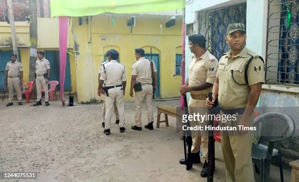 Police personnel deployed during a raid by National Investigation Agency officials in connection with the Popular Front of India case at...