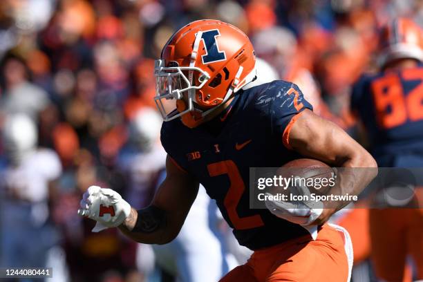 Illinois Fighting Illini running back Chase Brown advances the ball during the college football game between the Minnesota Golden Gophers and the...