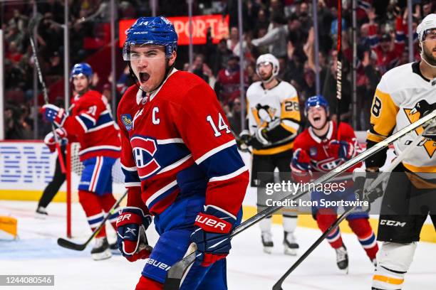 Montreal Canadiens center Nick Suzuki shows pride after scoring a goal during the Pittsburgh Penguins versus the Montreal Canadiens game on October...