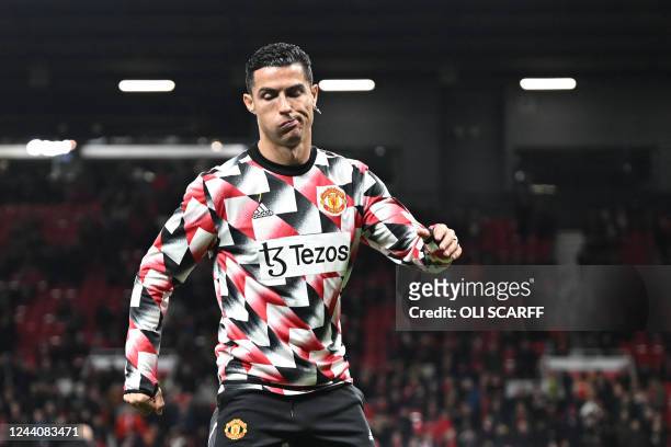 Manchester United's Portuguese striker Cristiano Ronaldo reacts during the warm up prior to the English Premier League football match between...