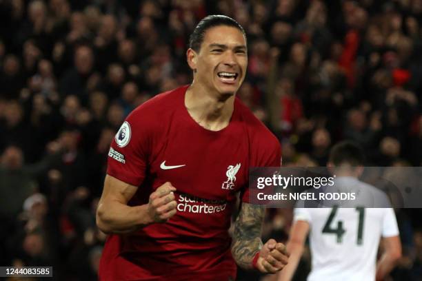 Liverpool's Uruguayan striker Darwin Nunez celebrates after scoring the opening goal of the English Premier League football match between Liverpool...