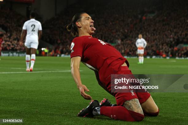 Liverpool's Uruguayan striker Darwin Nunez celebrates after scoring the opening goal of the English Premier League football match between Liverpool...